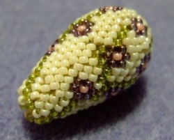 Anleitung umhäkelter Tropfen - 12x24 mm - Blümchen - pdf-file