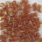 #02.0 - 25 Stück Two-Hole ZET Beads 5x6mm - tr. topaz red luster